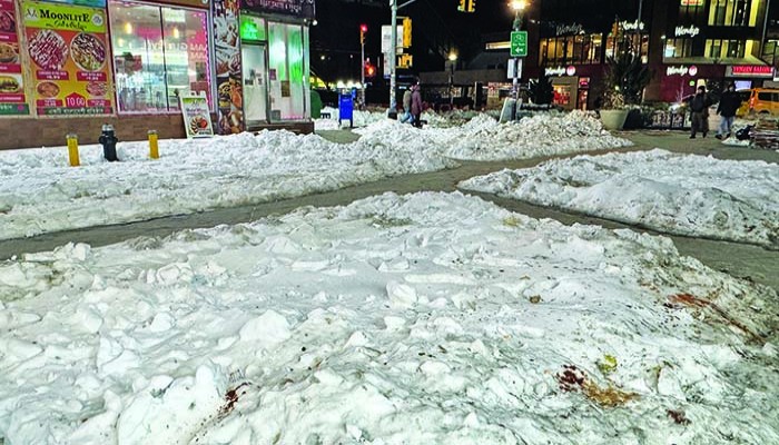 তুষার পরিষ্কার না করায় বাড়ির মালিকদের জরিমানা